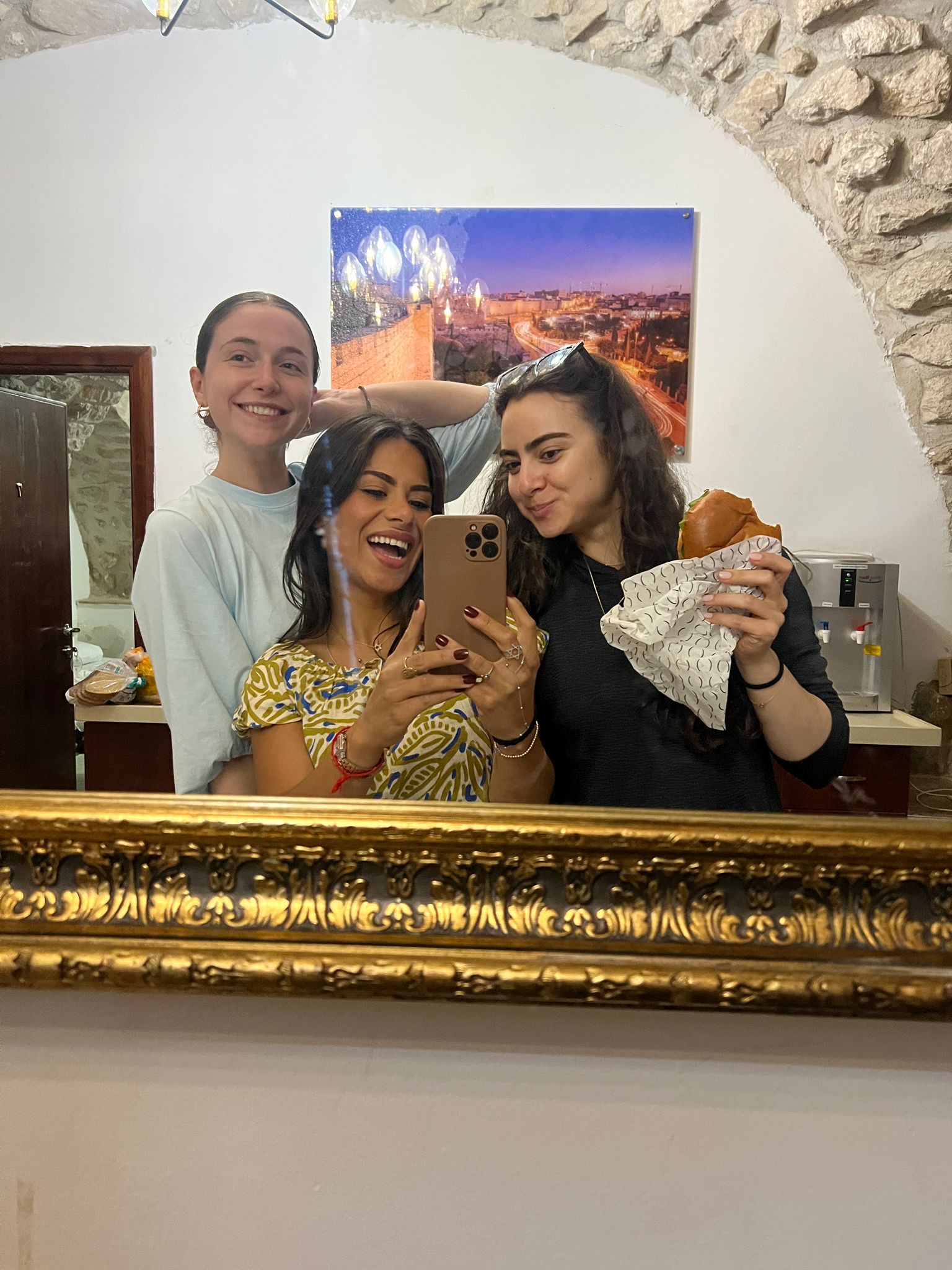 Three Akiva participants taking a mirror selfie